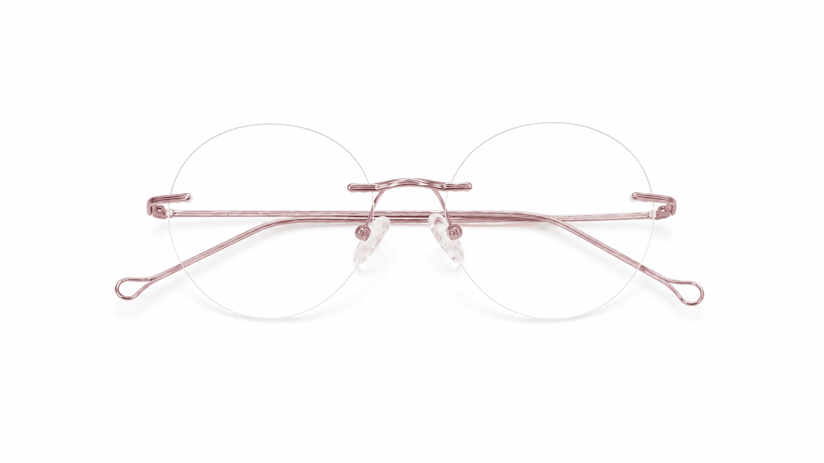 ليا نظارة طبية تيتانيوم من Yuva نظارة ليا (Lia) الطبية بدون إطار (Rimless) صناعة إيطالية بتصميم دائري باللون الوردي، مناسبة للجنسين وتلائم الوجوه المربعة والمستطيلة والبيضاوية والقلبية.