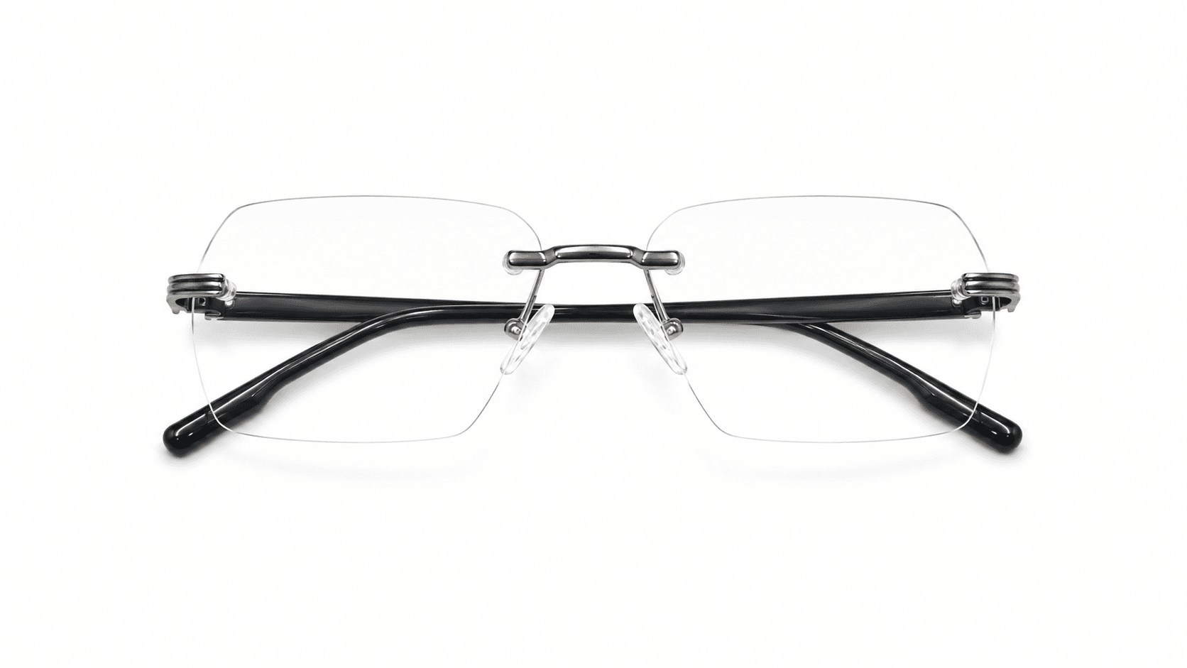 ألدو نظارة طبية بدون اطار من Yuva نظارة الدو الطبية بدون إطار (Rimless) صناعة إيطالية بإطار مستطيل باللون الرمادي الغامق والأسود، مناسبة للجنسين وللوجوه الدائرية والبيضاوية والقلبية.