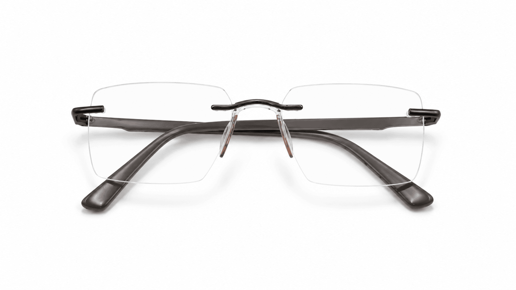 ريفال برونز نظارة طبية بدون اطار من Yuva نظارة ريفال (Rival) الطبية بدون إطار (Rimless) بتصميم مستطيل باللون البرونز، مناسبة للجنسين وتلائم الوجوه الدائرية والبيضاوية والقلبية والمربعة.